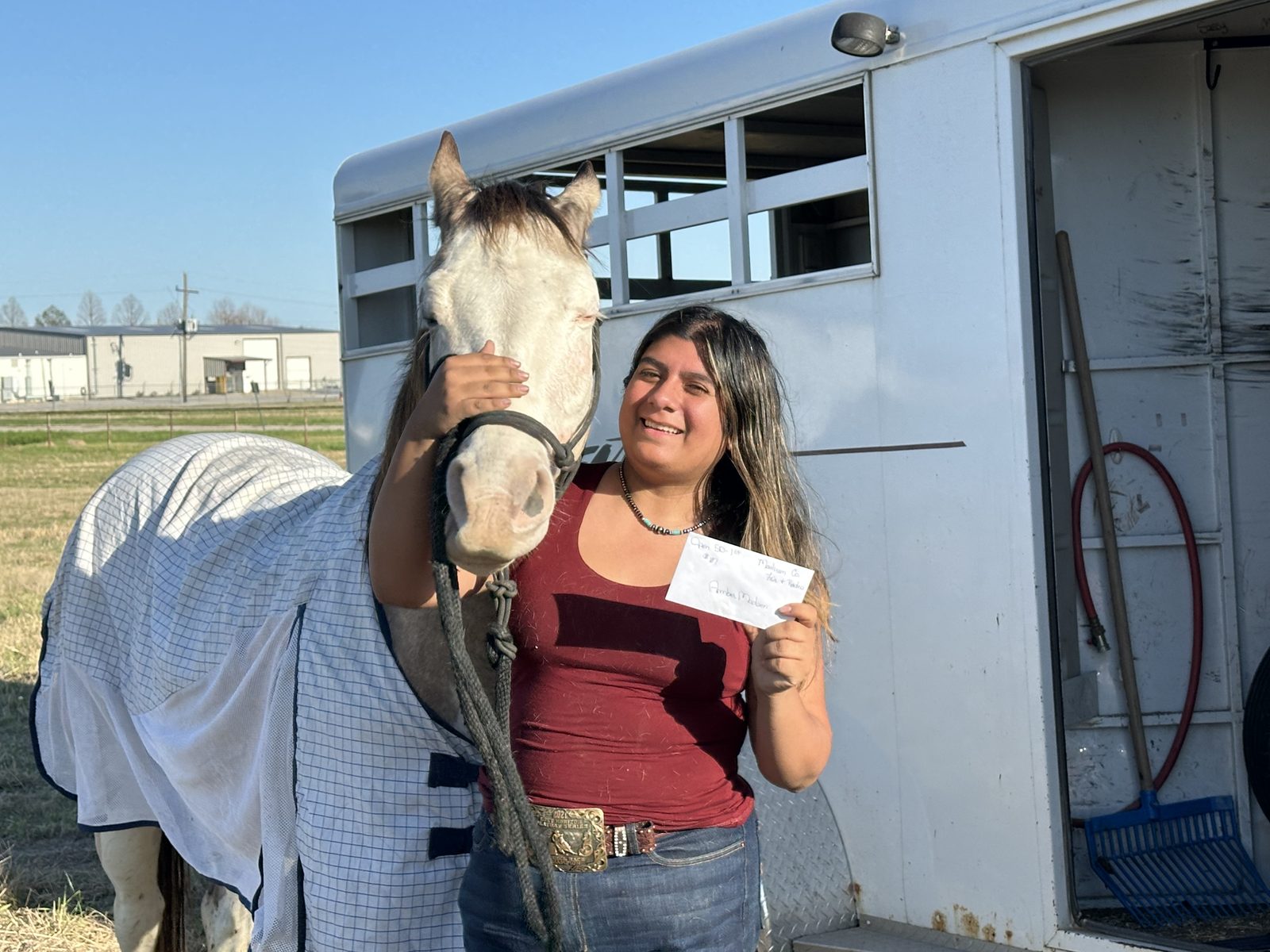 Prize photo from a horse competition showing the competitive side of our background